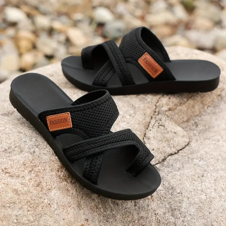 Slide-sandaler i perforeret mesh